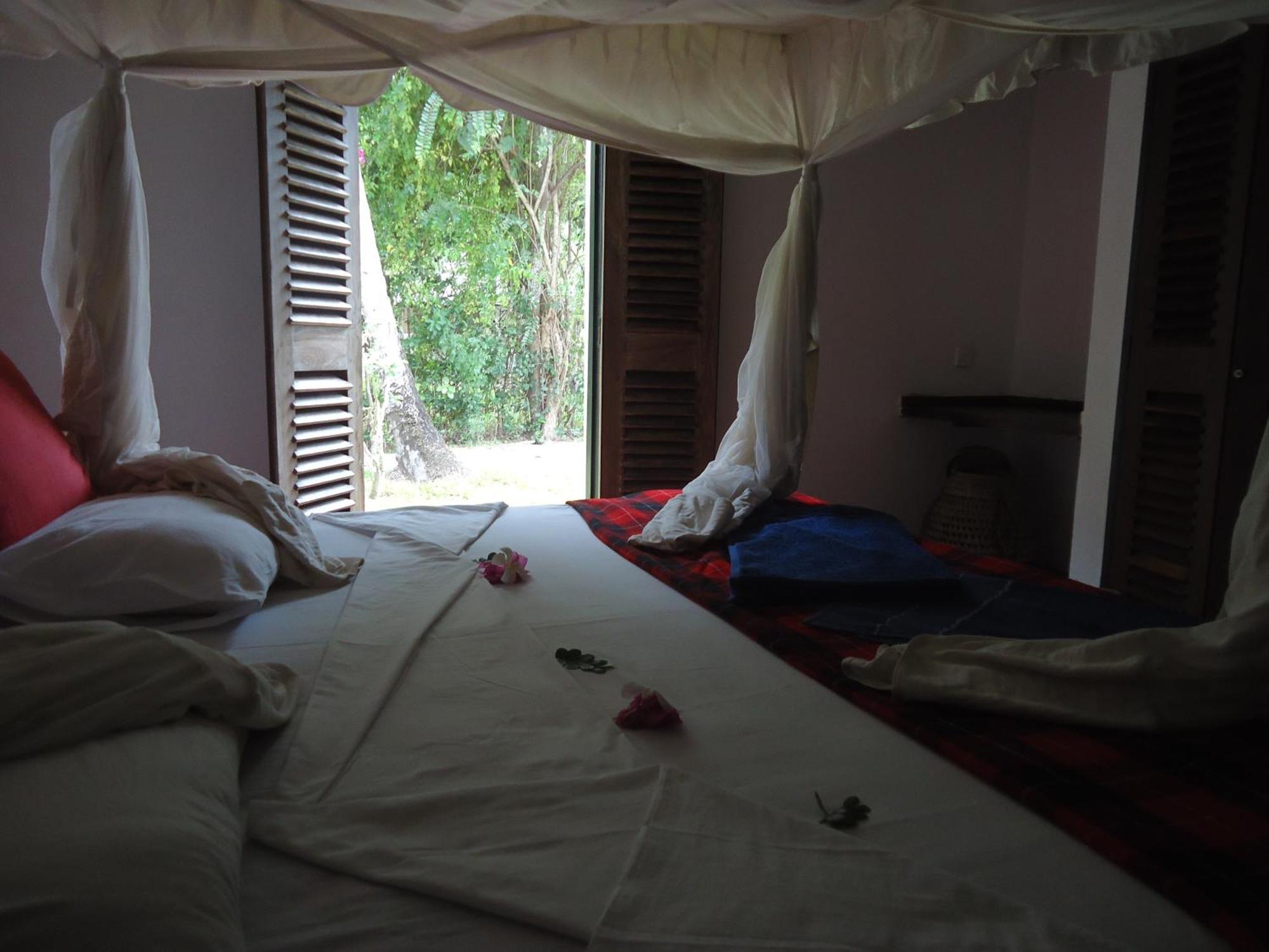 Kusini Beach Cottages Diani Beach Zimmer foto