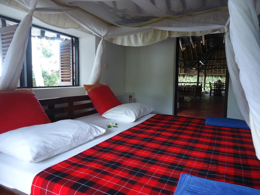 Kusini Beach Cottages Diani Beach Zimmer foto