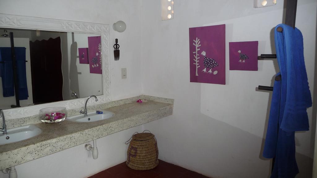 Kusini Beach Cottages Diani Beach Zimmer foto